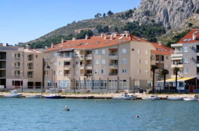 Отель Apartments by the sea Omis - 6073  Омиш
